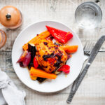 Plate of harissa marinated chicken and vegetables