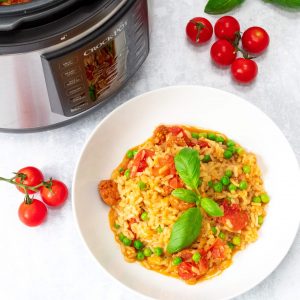 Crock Pot® Express Multi-Cooker with Chorizo risotto and cherry tomatoes