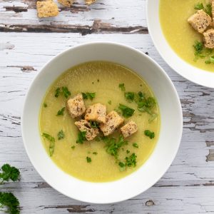 Spiced celeriac soup in a white bowl