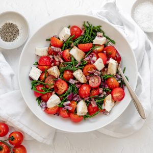 bowl of samphire salad with tomatoes and mozzarella