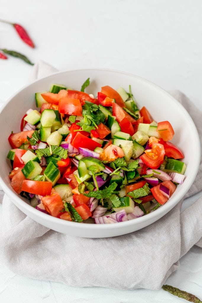 bowl of Indian tomato and cucumber salad