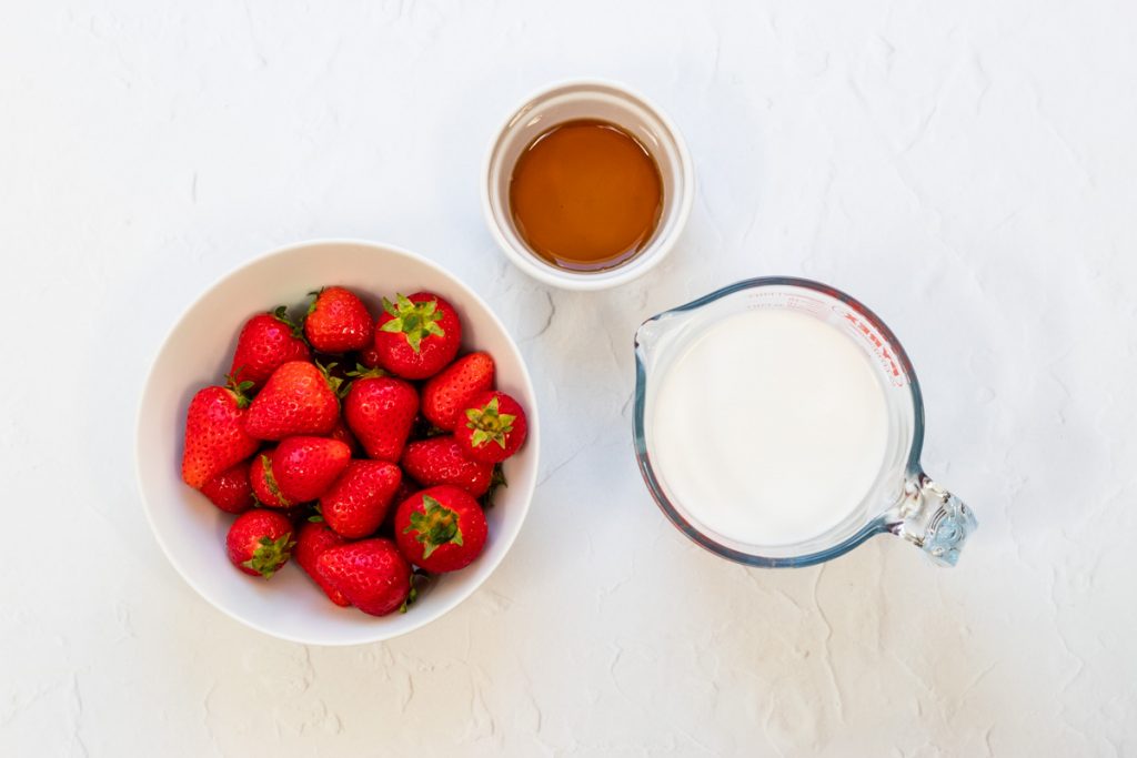 Ingredients for coconut milk strawberry ice lollies