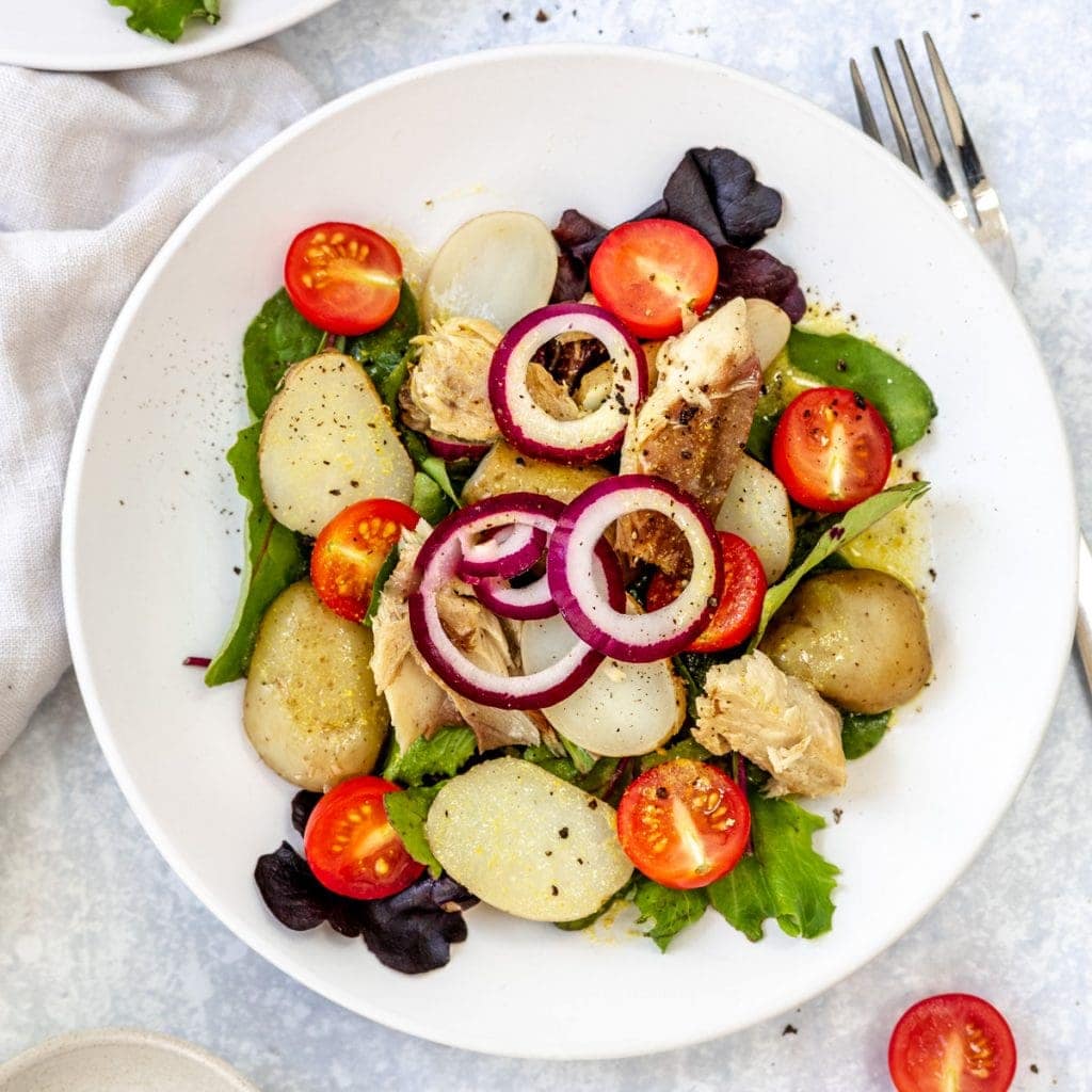 plate of tinned mackerel salad with new potatoes