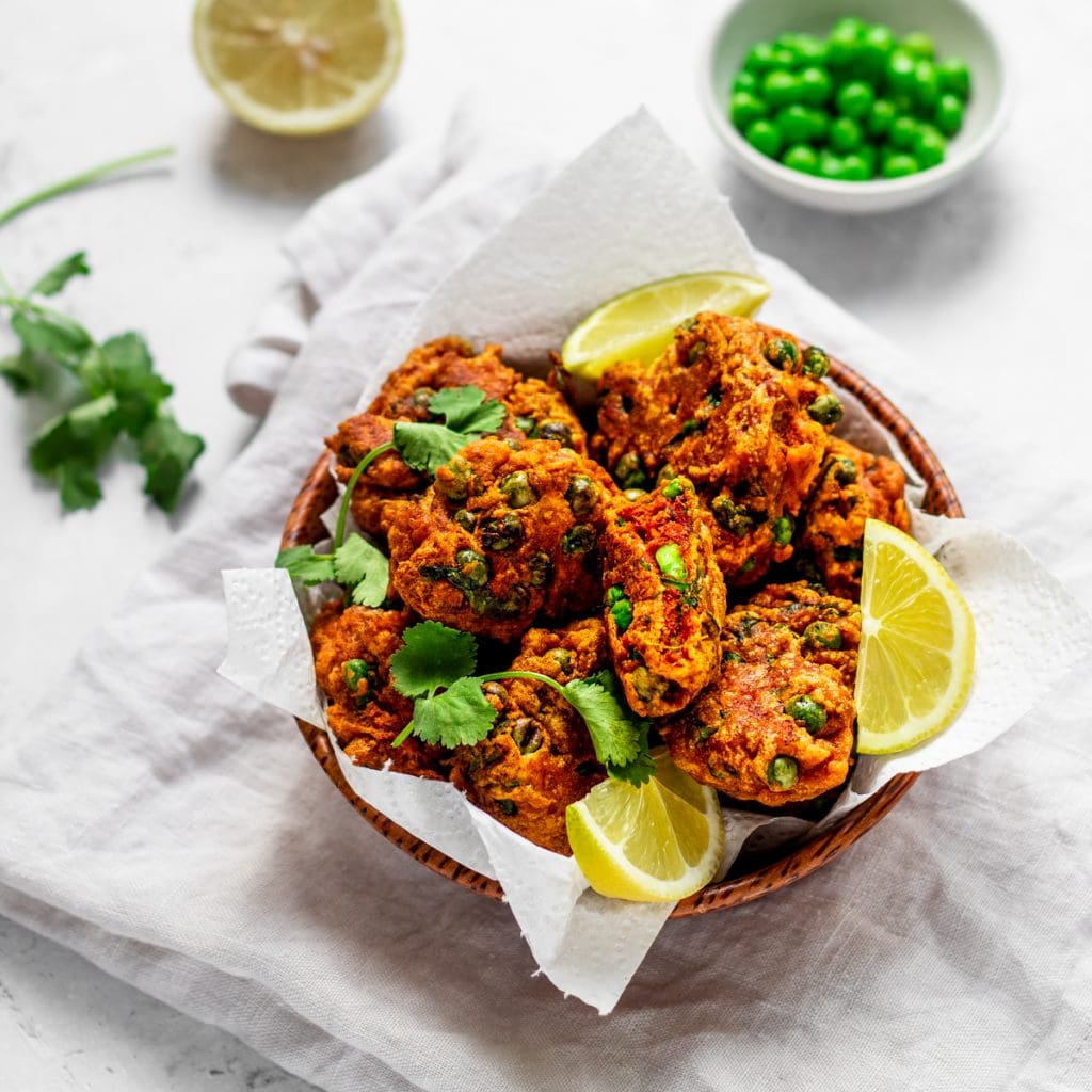 Bowl of spicy pea pakoras