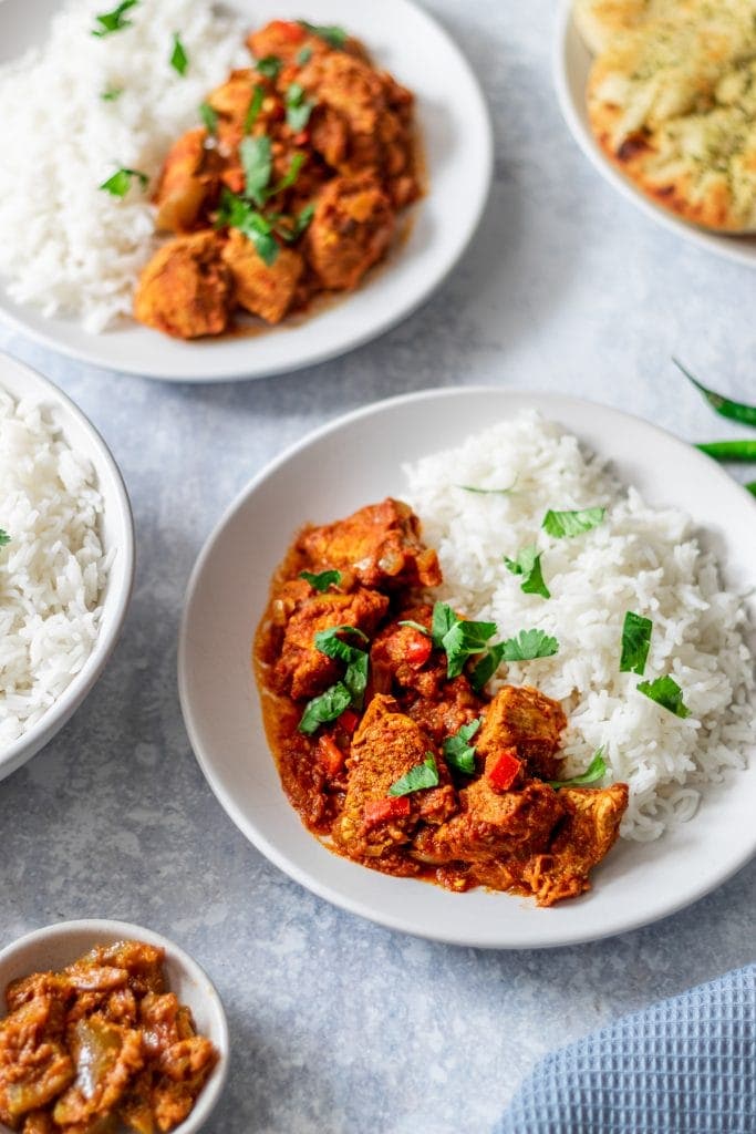 two plates of chicken bhuna