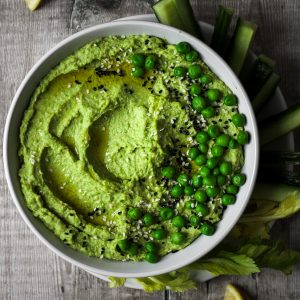 Green pea hummus in a bowl