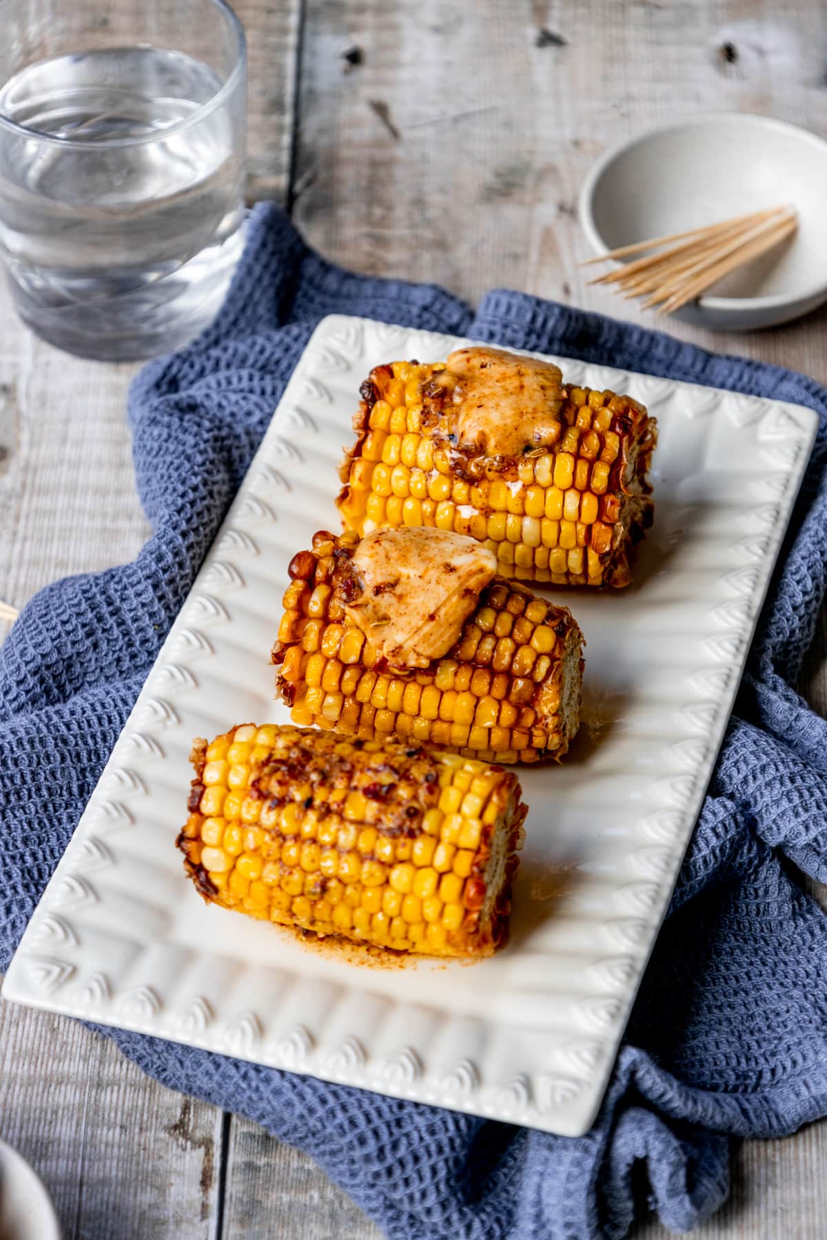 Air fried corn topped with butter